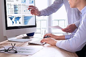 businessmen analyzing map data using a raw API