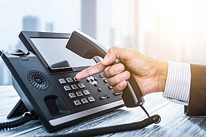a sales representative using map data to call new potential customers