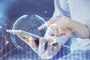 a woman with a smartphone showing a globe pattern on it to represent sales call planning